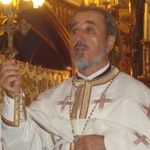 Un preot vâlcean face cinste României, peste hotare