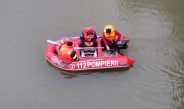FOTO: Persoana căzută în râul Olt este căutată cu scafandri și sonar. Ploaia și vântul au întrerupt, temporar, desfășurarea misiunii